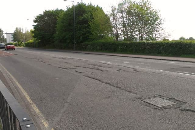 This pothole goes across the entire lane in Oxford Road, Aylesbury