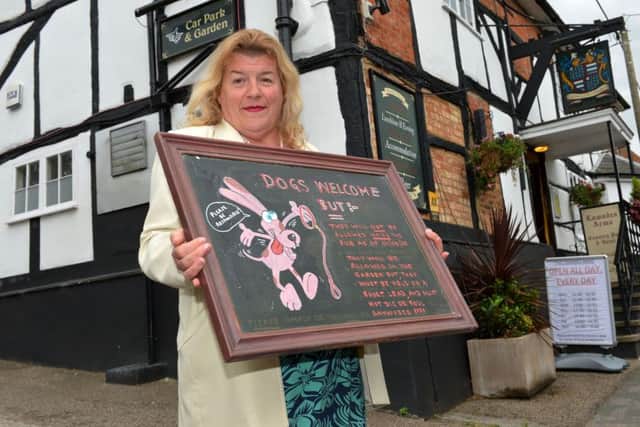 The Lowndes Arms, Whaddon is adopting a no dogs in the pub policy. Pictured is Suzy Chandler, landlady