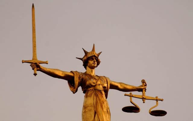 The Scales of Justice on top of the Old Bailey