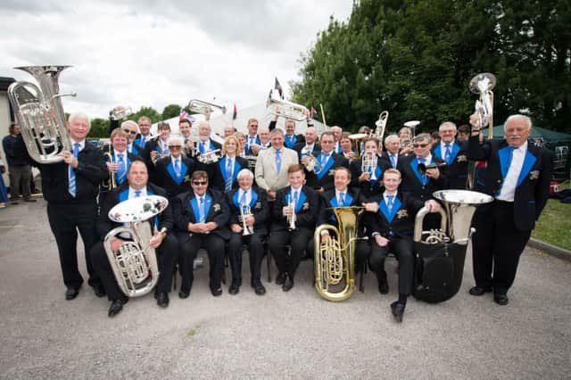 Marsh Gibbon silver band celebrates it's 150th anniversary - pictured are all the members of the band