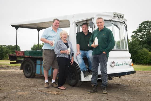 The Bond Brothers of Whitchurch end their milk delivery service - pictured are Guy, Ashley, and Andrew with mum Peggy
