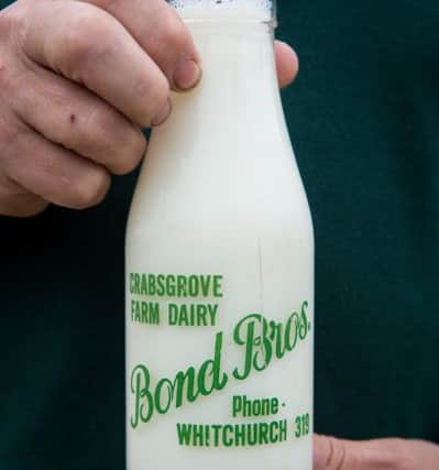 The Bond Brothers of Whitchurch end their milk delivery service - pictured is one of their original milk bottles from 50 years ago when they operated from Crabsgrove Farm Dairy