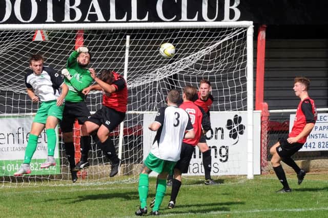 Tring Athletic FC, in black and red, versus Leverstock Green FC