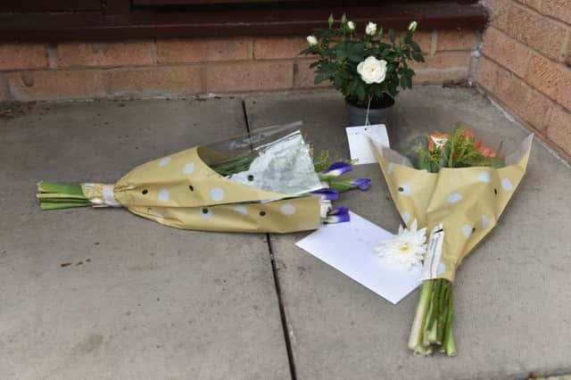 Flowers were placed outside the Hewitt family home in Shenley Church End, Milton Keynes