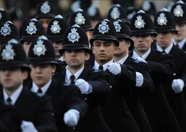 Reports claim that more than 20,000 police jobs could be slashed as a result of fresh spending cuts. Photo: Stefan Rousseau/PA Wire