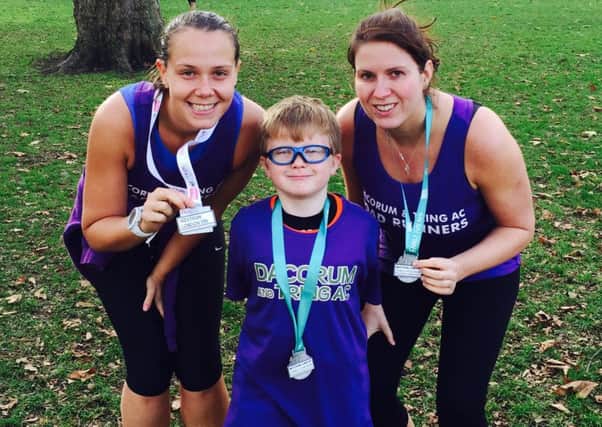 Clare Hunt and Kayleigh Halvey with Kayleigh's nephew Reilly at the Vitality WestRun London race