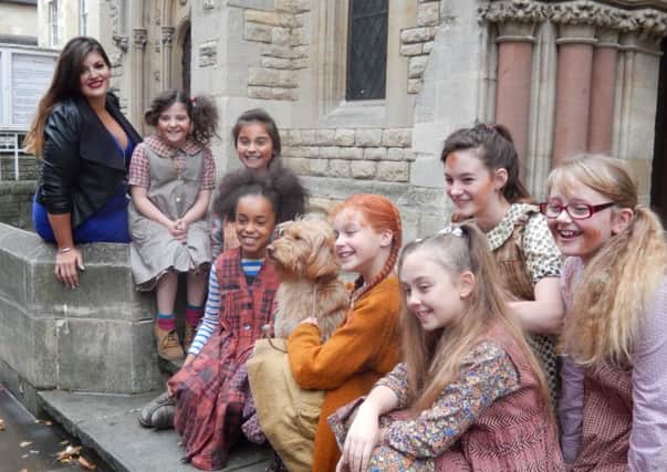 Jodie Prenger and some of the children who perform in Annie