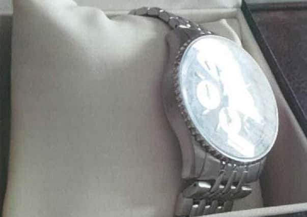 The photo of a fake watch sent by Mark Cox to insurers PNL-161201-155553001