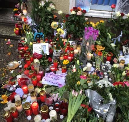 Tributes to David Bowie at the home he shared with Iggy Pop at Hauptstrafle 155, Schoneberg Berlin, following the announcement of his death on January 11 2016