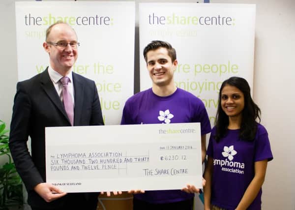 Cheque presentation by Richard Stone, chief executive at The Share Centre, to Stefan Antill, community fundraiser, Lymphoma Association and Dharini Roula, fundraising administrator, Lymphoma Association.