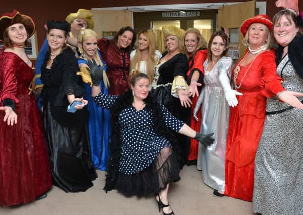 Buckingham Lodge Care Home, Aylesbury, music hall. Home manager, Wendi Luck, 2nd from right in red and her staff got into the music hall spirit with singer, Maria Scobey, in the front.