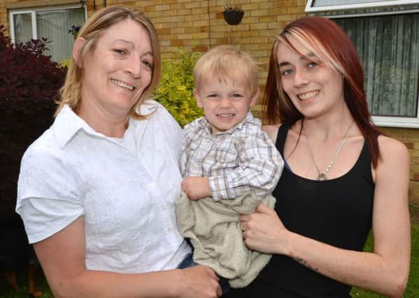 Pictured three months after the crash in 2012, Tracy Howe (left) with her grandson Kieron and her daughter Zoe Glendening-Day
