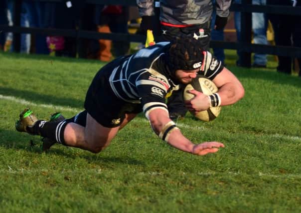 Henry Lamont goes over for a try. Picture by Aaron Bayliss