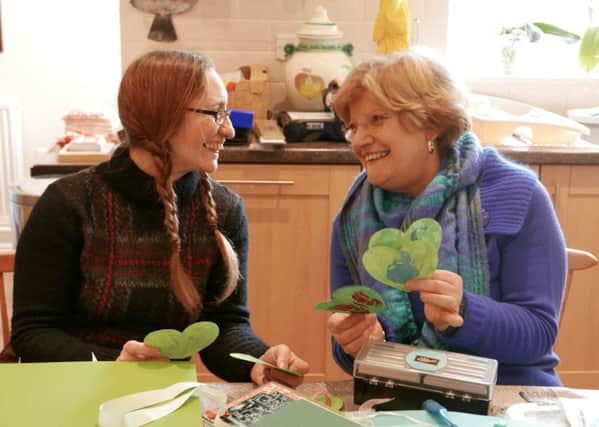 Cheddington WI - Secretary Lorraine Firmin and President Irene Johnston are helping raise awareness of climate change