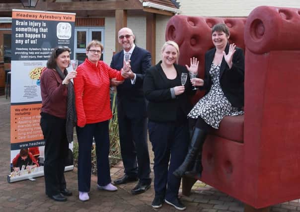 Honey Bee in Aylesbury donates to Headway, from left, Karen Gay, Susie Davies, Phil Simmons (Chairman of Headway), Natalie Jackson(Manager of Honey Bee) and Karen Styles.