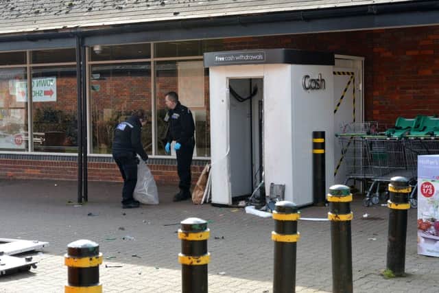 The HSBC cashpoint was raided at Waitrose, Buckingham. Police at the scene. PNL-160226-141149009