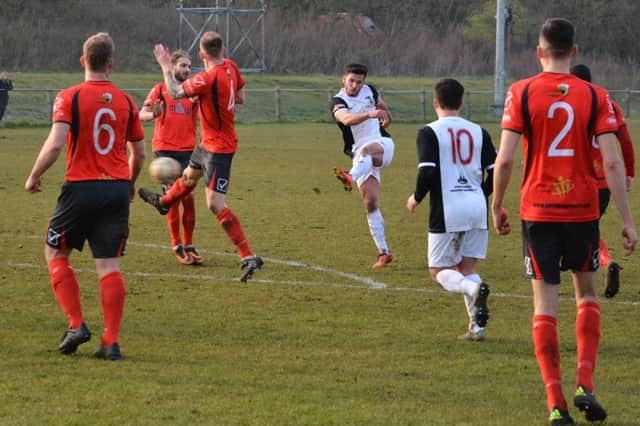 Kings Langley's Gary Connolly volleys the ball home for the first goal. Picture (c) Chris Riddell