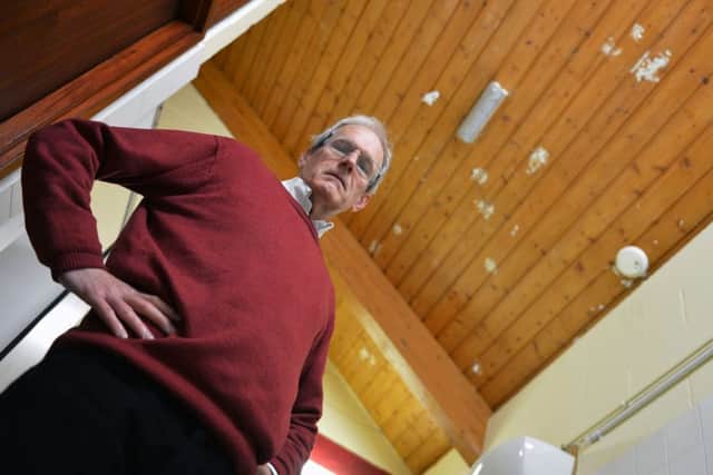 Cllr. Paddy Collins, treasurer of Buckingham Community Hall Association, showing vandalism in the toilets at Buckingham Community Centre.