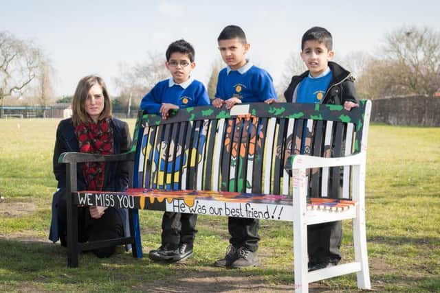 Unveilling of bench in memory of Mohammed Ali - pictured are his class teacher Sarah Whittaker and some of his classmates PNL-160321-152554009