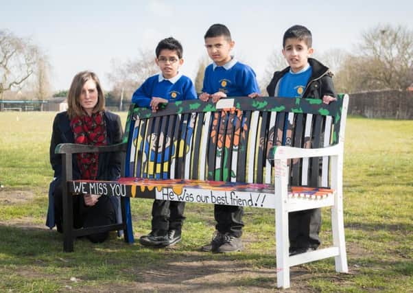 Unveilling of bench in memory of Mohammed Ali - pictured are his class teacher Sarah Whittaker and some of his classmates PNL-160321-152554009