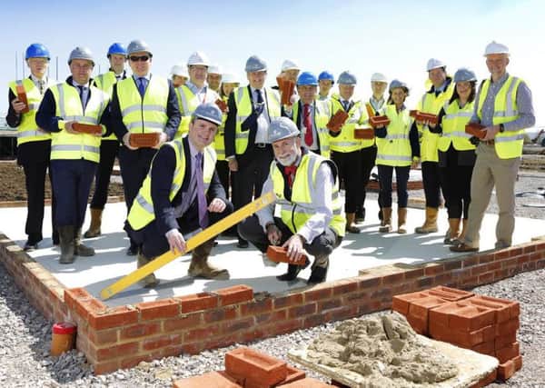 The first bricks are laid at new homes being built as part of the Kingsbrook development