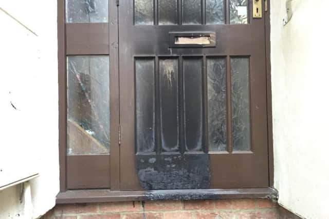 The damaged door
