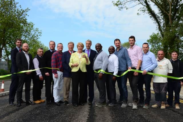 Cllr Val Letheren cuts the ribbon to open the new Stocklake link road PNL-160527-170619001