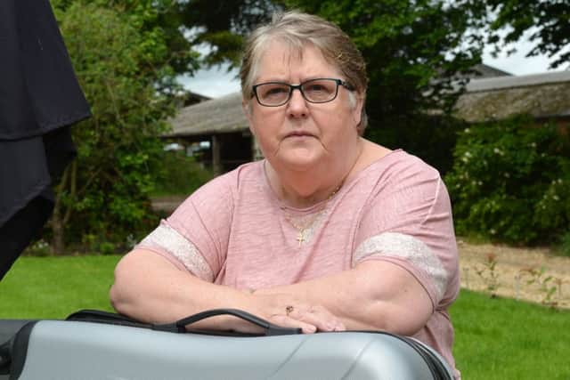 Carer, Pam Kingston-Smith, from Middle Claydon has had the annual holiday payment for her autistic son, Chris, stopped. PNL-160614-120424009
