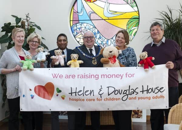 Kay Horner and Alison Hooker, Fund Raising team, Mel Shah, TLC Coordinator in Bucks, Graham Dearing, Assistant Head of Freemasonry in Bucks, Hazel Bedford, Director Fund Raising and Marketing, Tom Davies, Planet Lodge, at the presentation of teddies.