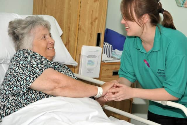 Nurse and patient at Florence Nighingale Hospice