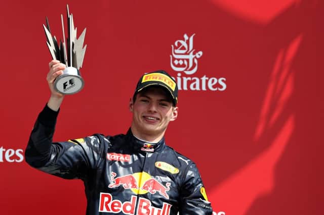 Max Verstappen on the podium at Silverstone.