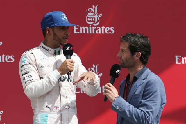 Mark Webber and Lewis Hamilton on the Silverstone podium after Hamilton's British Grand Prix victory. Photo: Jakob Ebrey