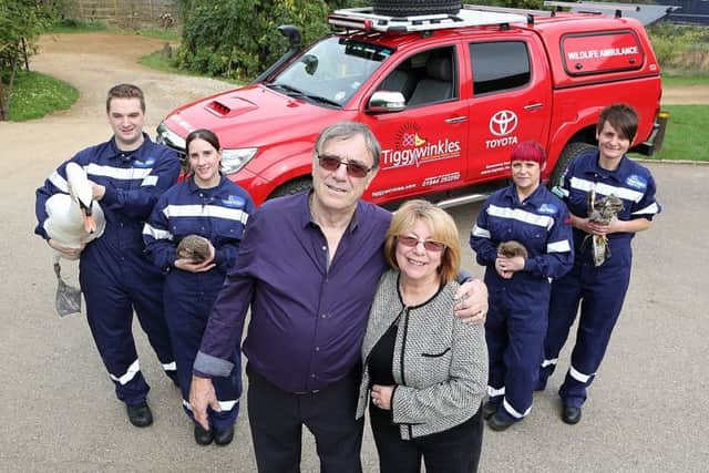 Tiggywinkles founders Les and Sue Stocker (centre) with the team.