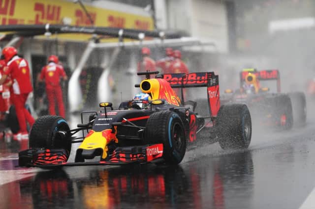Daniel Ricciardo and Max Verstappen in the Budapest downpour during Q1