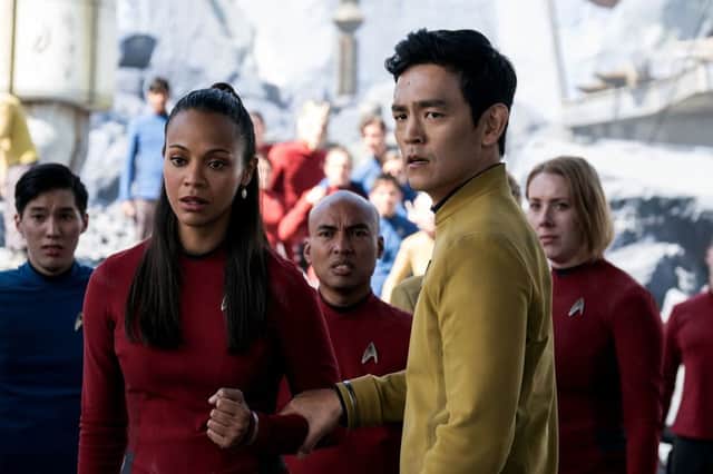 Zoe Saldana as Uhura and John Cho as Sulu