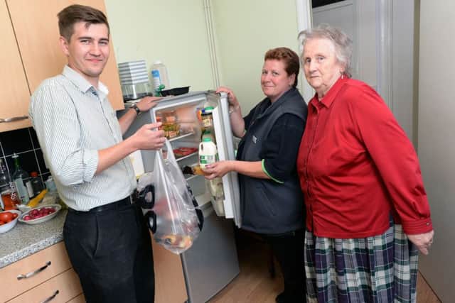 Steeple Claydon Co-op delivered groceries while they were shut due to a ram-raid. From the left, Igor Kanchukovskyi, duty manager, Lorraine Whitehead, customer team member and Wyn Pratt.