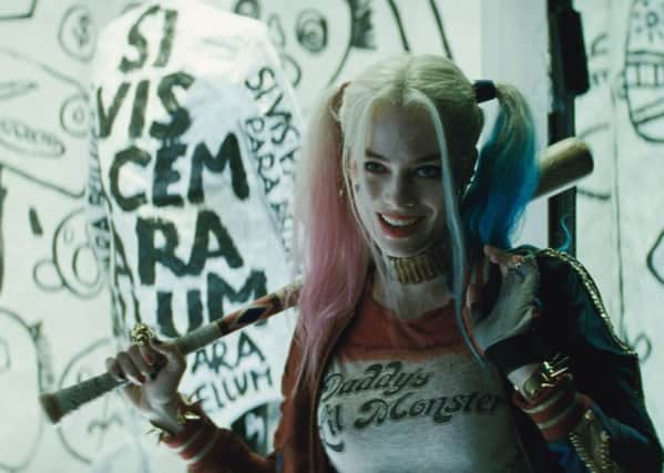Margot Robbie as Harley Quinn
