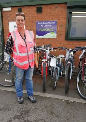 Young prisoners at atÂ HM Young Offenders InstituteÂ in Aylesbury have been repairing bicycles to raise funds to help patients at South Bucks Hospice. Aston Clinton reuse manager, Sue Rance. PNL-160508-152743001