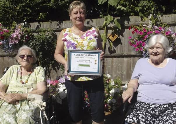 Karen White, activity co-ordinator at Lewin House, wins gardener of the year.
