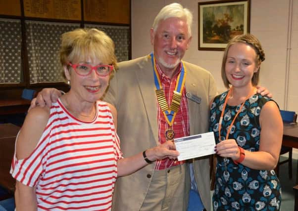 President of The Rotary Club of Aylesbury Hundreds, Roger King with Leah Lewis, Community Fundraiser and Sha Carter-Allison, Project Co-ordinator both from The PACE Centre PNL-160509-115010001