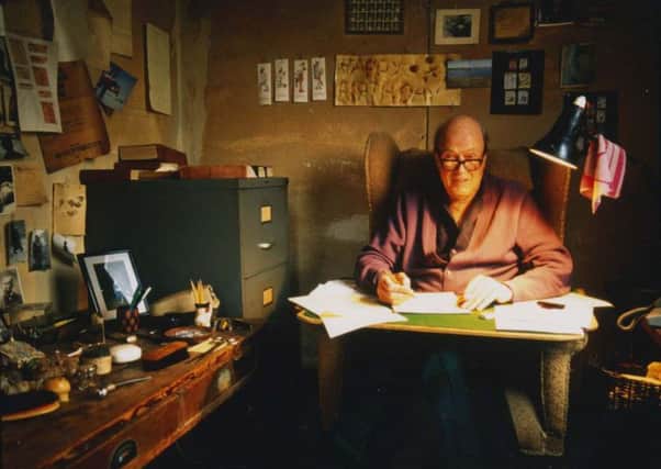 Roald Dahl at work in his famous writing hut