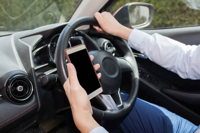 Phone use behind the wheel at epidemic levels