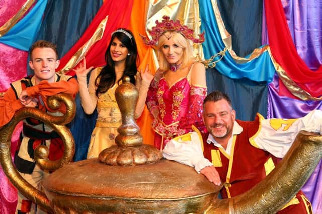 Aylesbury Waterside pantomime Aladdin, Christmas 2016. Starring Danny Colligan as Aladdin, Jasmin Walia as Princess Jasmine, Michelle Collins as the Genie of the Ring and Andy Collins as Wishee Washee