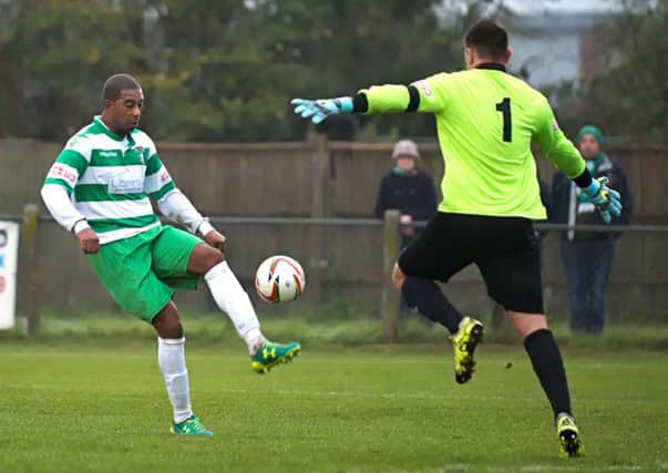 Bruno Brito produced a superb lob to hand Aylesbury the lead against Ashford. Picture: Mike Snell