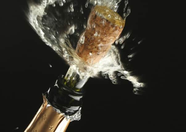 Champagne splash. Bottle and cork, celebration time ENGNNL00120120330142655