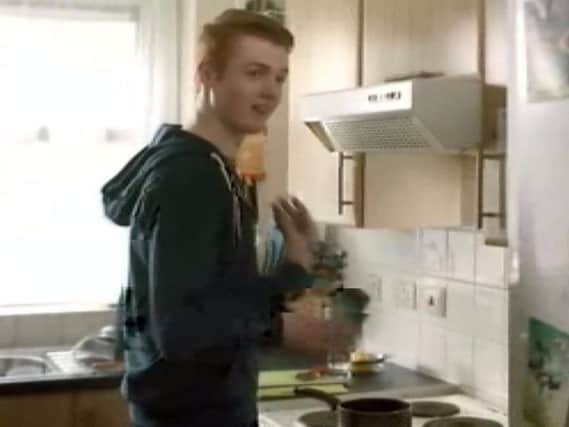 Handout still taken from video issued by the Advertising Standards Authority of a Heinz advert that teaches viewers how to use tin cans to drum out a song which has been banned for encouraging behaviour that risks health and safety.