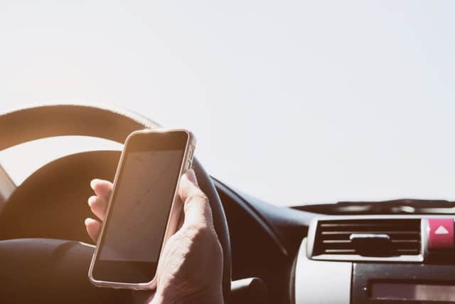 Drivers back blanket ban on mobiles