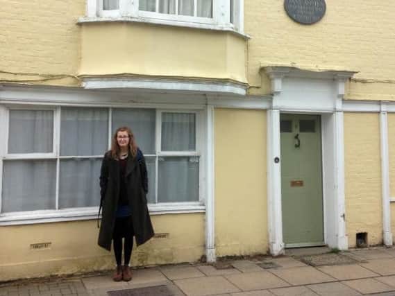 Travel writer Ella Walker outside Jane Austen's house.