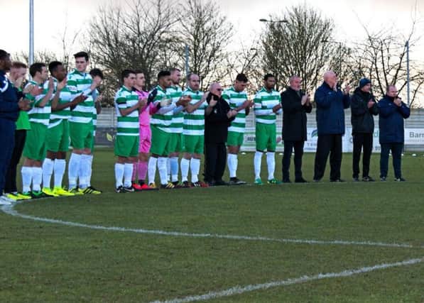 Aylesbury United assistant manager Gary Hawksworth died unexpectedly one year ago and he was remembered with one minute's applause before the kick-off. Picture by Mike Snell