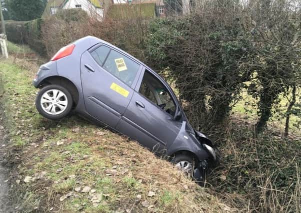 Firefighters rescued a car after it ended up in a ditch near Thame